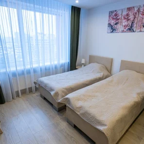 Апартаменты с двумя односпальными кроватями